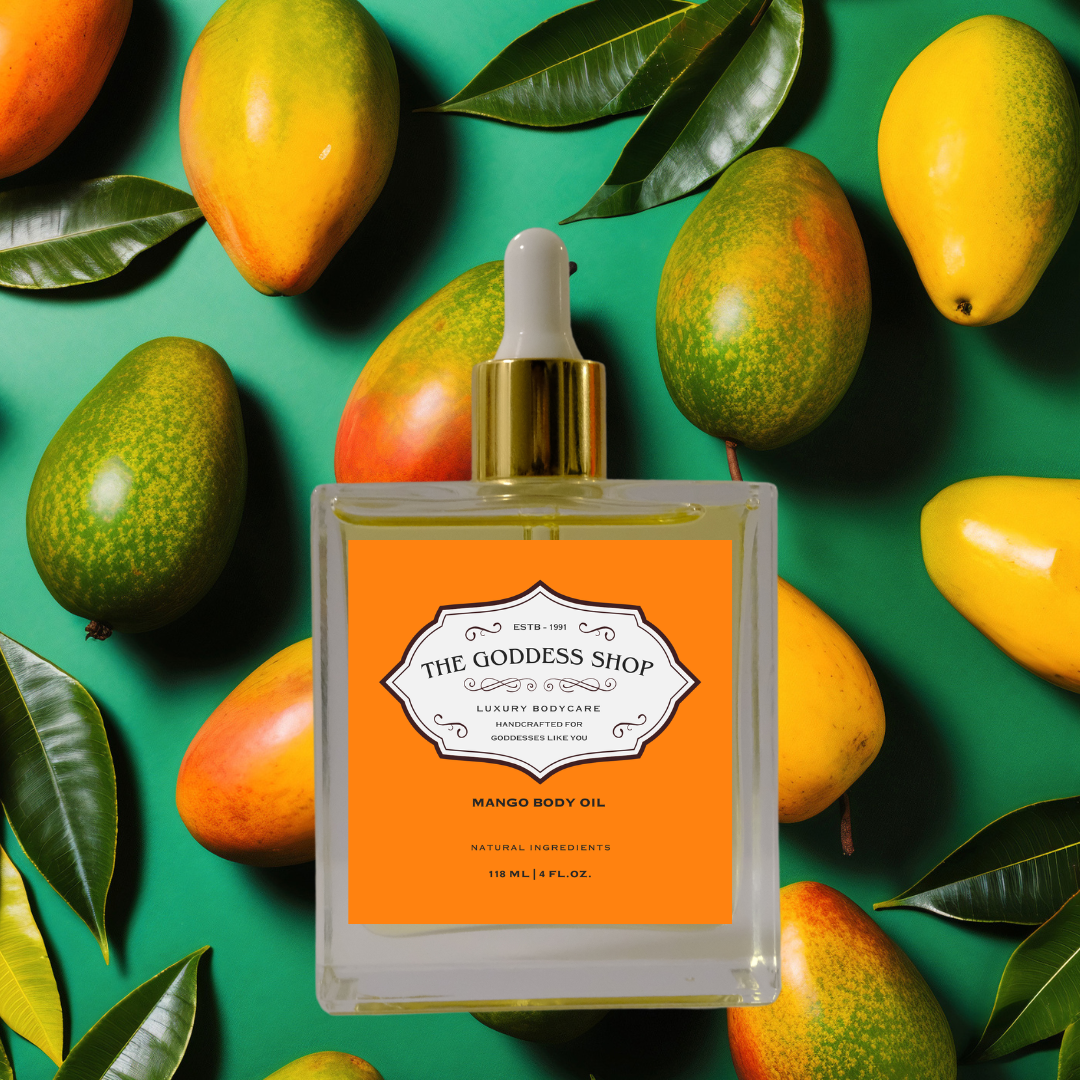 bottle of mango body oil with mangos in the background