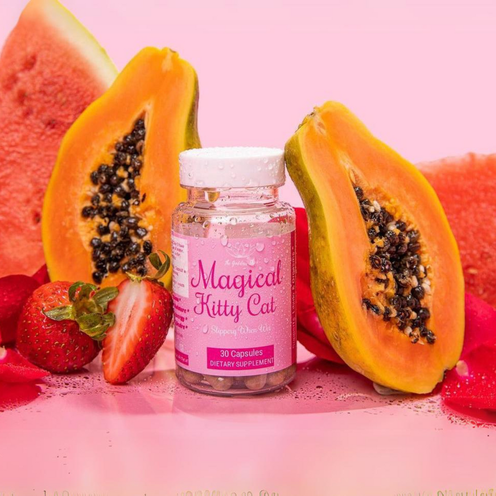 Vaginal Dryness supplement The Magical Kitty Cat surrounded by cut papaya, strawberries, watermelon, and rose petals.